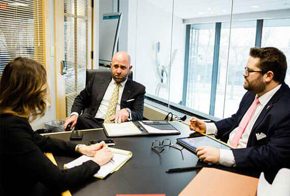 Photo of the firm's attorneys in the office