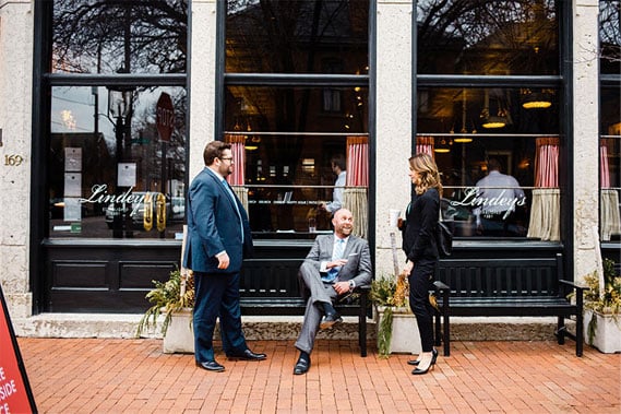 The attorneys outside a coffee shop